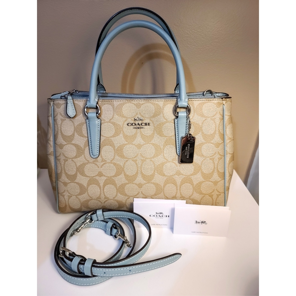 Tan/Teal Coach purse.